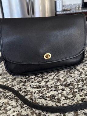Classic Black Leather Crossbody Bag with Gold Turn-Lock